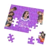 A child developing fine motor skills by handling the Encanto puzzle pieces.