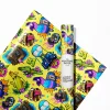 A roll of vibrant Fortnite Battle Royale wrapping paper for birthdays, featuring popular character skins on a glossy, high-quality 90 GSM paper.