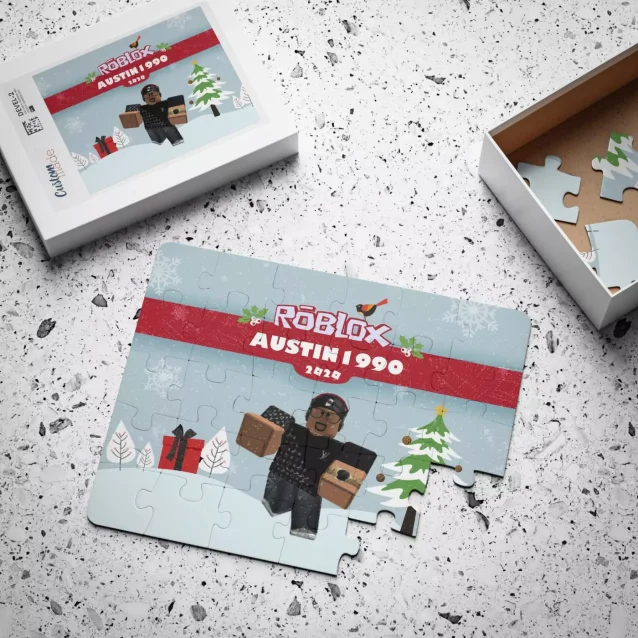 The Roblox Christmas puzzle displayed in its premium, gift-ready metal keepsake tin with the lid on.