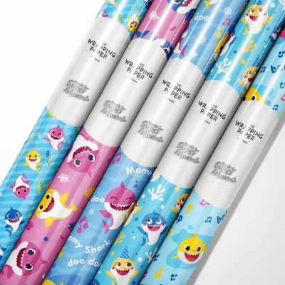 Cute pastel Baby Shark gift wrap for nursery presents.