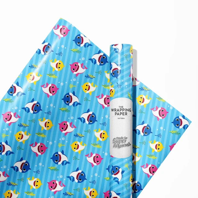 Kids' birthday present wrapped in vibrant Baby Shark wrapping paper.