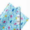 Various sizes of Baby Shark wrapping paper rolls displayed.