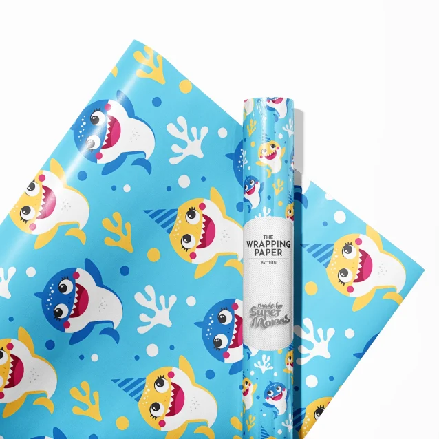 Close-up of the glossy finish on Baby Shark birthday wrapping paper.