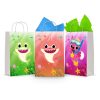 Three printable Baby Shark goodie bag fronts on paper party bags — underwater reef scenes with coral, starfish and bubbles, each with a shark swimming through.
