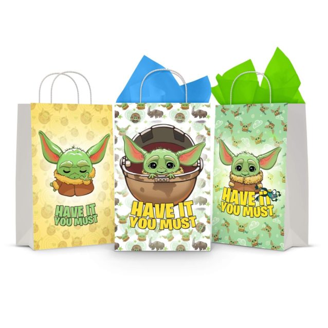 Three printable Baby Yoda goodie bag fronts on paper party bags — Grogu on a gold pod-pattern background, Grogu in his pod, and Grogu on a patterned green background, each saying "Have It You Must".
