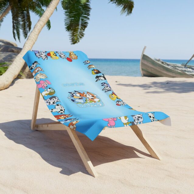Bluey and Bingo pool towel shown here in soft, absorbent polyester terry, ready for beach and bath days.