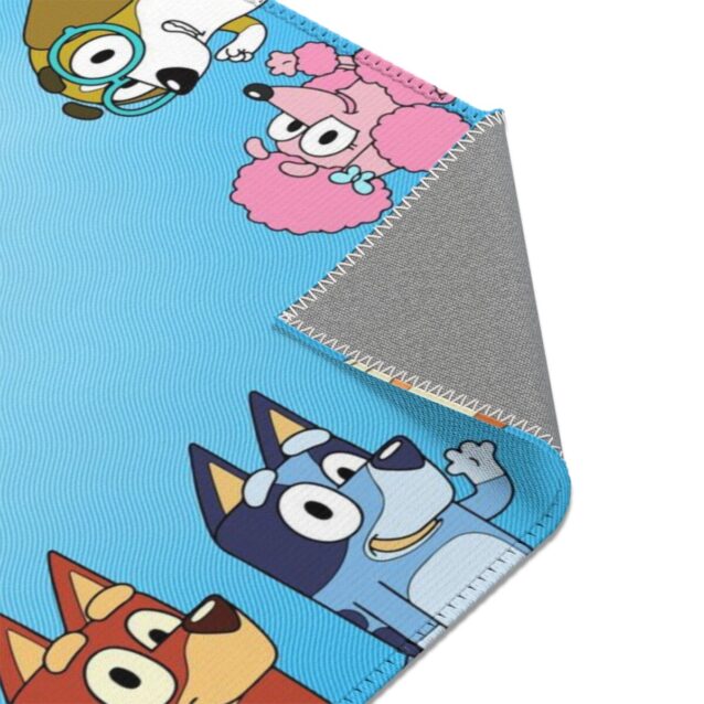Bluey and Bingo star on this soft kids area rug, a colorful floor rug for the bedroom or playroom