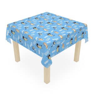 Bluey and Bingo dancing on a personalized blue polyester birthday tablecloth.