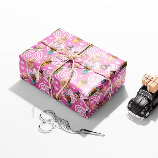 Close-up of a brightly colored Boss Baby gift wrap with Theodore Templeton.