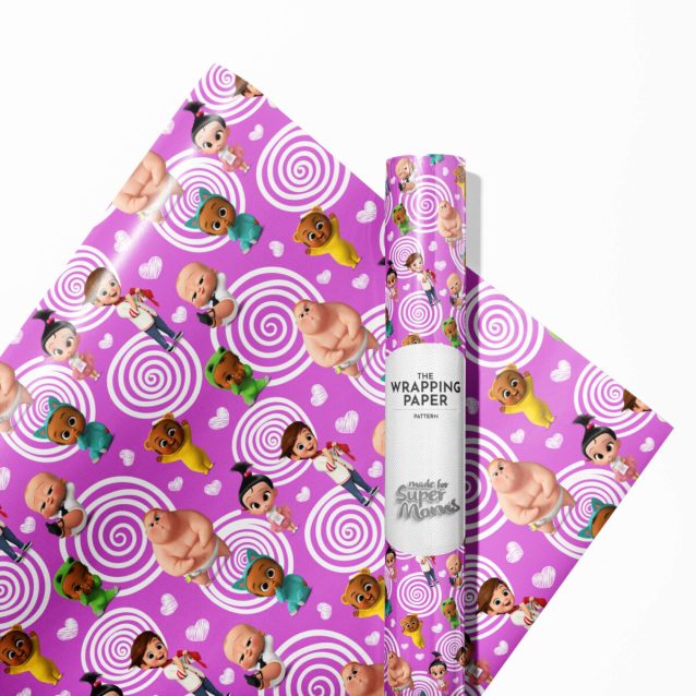 Boss Baby wrapping paper roll next to a pair of scissors and tape.