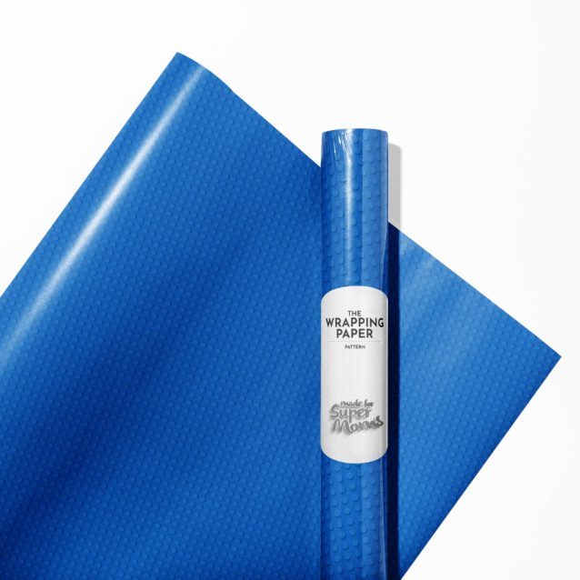 Multiple rolls of Lego wrapping paper in various sizes=