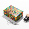 Roll of vibrant Lego wrapping paper featuring colorful Lego bricks.