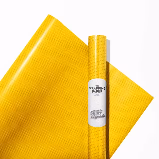 Close-up of the gloss finish on the Lego theme wrapping paper.