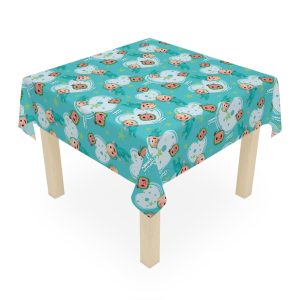 Large 104x60 Cocomelon banquet tablecloth covering an 8-foot rental table at a birthday venue.