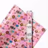 "A stack of presents beautifully wrapped in different Cocomelon designs."