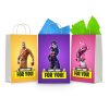 Three printable Fortnite goodie bag fronts on paper party bags — Cuddle Team Leader on pink, Dark Bomber on purple and the gingerbread skin on orange, each with a "Supply Drop — For You!" banner.