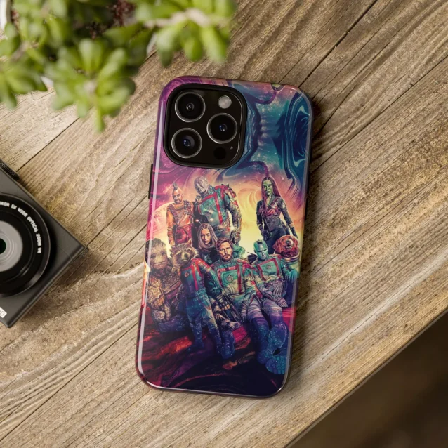 A person holding an iPhone with a Guardians of the Galaxy phone case.