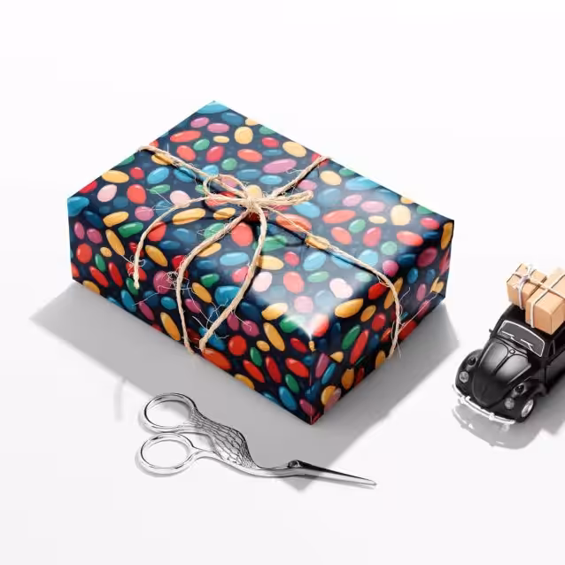 Roll of Harry Potter Christmas wrapping paper featuring Hogwarts castle in snow.