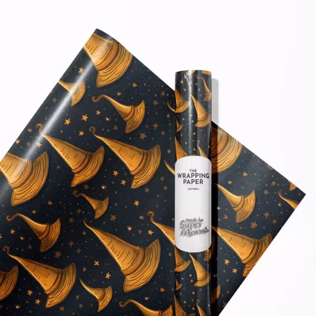 Child excitedly unwrapping a gift covered in Harry Potter Christmas paper.