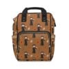 Brown Harry Potter baby bag with chibi Harry and Hedwig artwork and red accents.