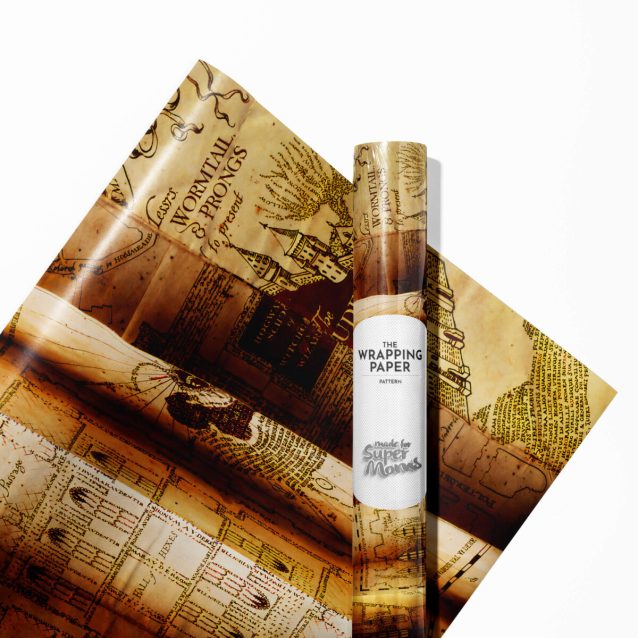 A neatly wrapped gift using Harry Potter wrapping paper, tied with a gold ribbon.