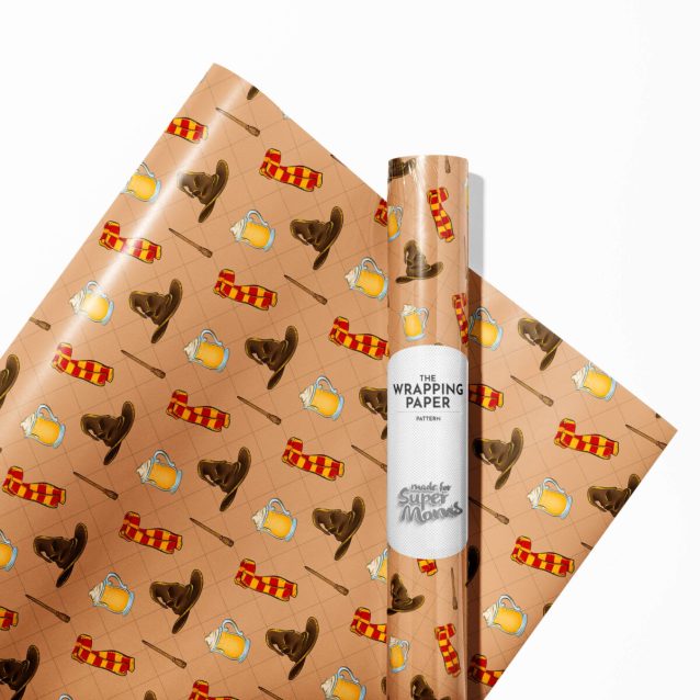 Edge-to-edge print detail on Harry Potter wrapping paper showing iconic symbols like the Golden Snitch.