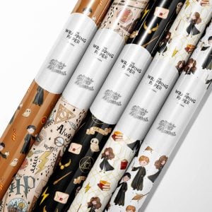 Roll of Harry Potter wrapping paper featuring a repeating pattern of the Hogwarts crest.