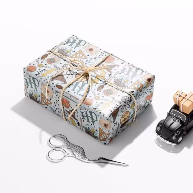 High-quality 90 GSM Harry Potter gift wrap roll with a smooth texture.