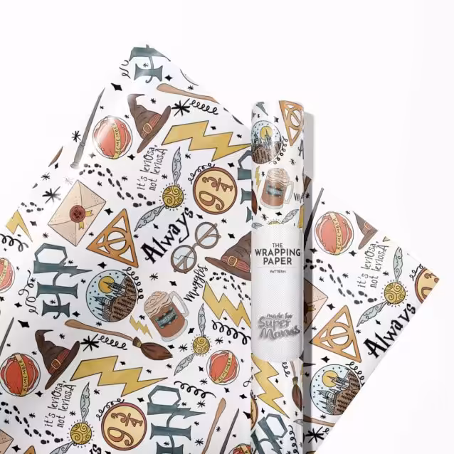 Several rolls of Harry Potter themed wrapping paper in various sizes.