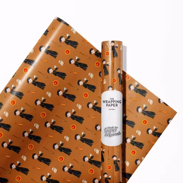 Stack of Harry Potter wrapping paper rolls ready for gift preparation.
