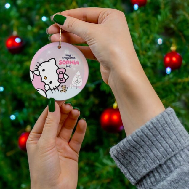 Soft pink Hello Kitty ornament with teddy bear and bow, personalized with your child's name for Christmas