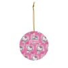 Repeating pink Hello Kitty pattern on a round personalized Christmas ornament for kids