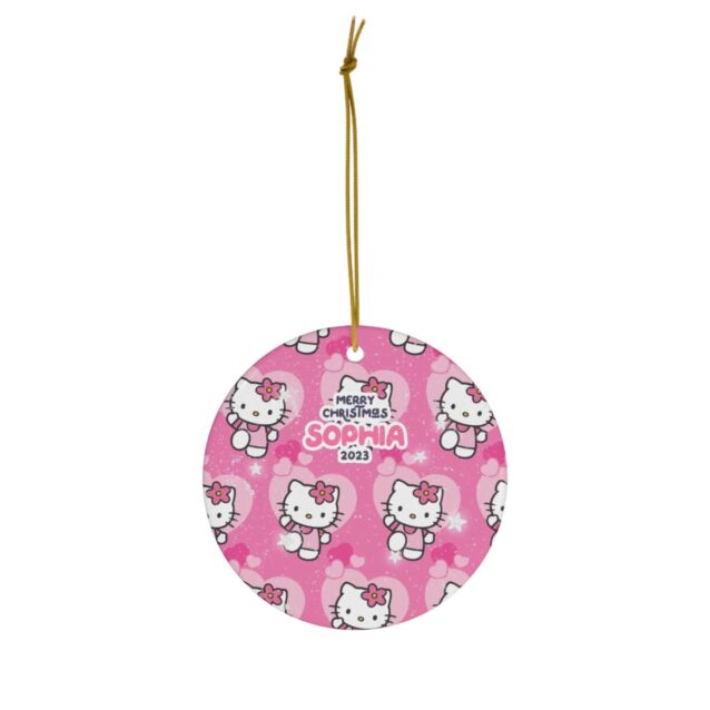 Repeating pink Hello Kitty pattern on a round personalized Christmas ornament for kids
