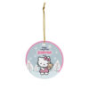Hello Kitty in a red dress holding her teddy in a blue winter village - custom name Christmas ornament