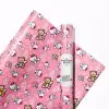 Action scene with Hello Kitty and friends on high-quality gift wrap.