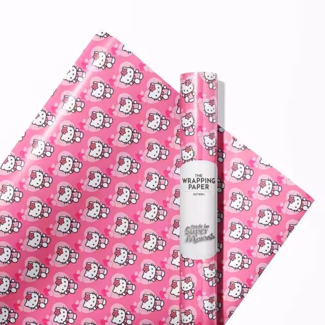 Edge-to-edge print detail on a roll of Hello Kitty character wrapping paper.