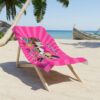 Custom L.O.L. Surprise beach towel spread out poolside, the dolls printed bright on soft superfine terry.