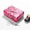A stack of presents adorned with LOL Surprise gift wrap.