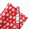 A neatly wrapped gift using LOL Surprise Wrapping Paper with a glossy finish.