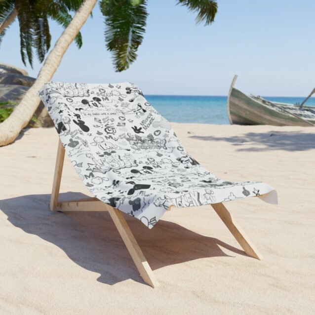 Custom Mickey Mouse beach towel laid flat, the classic character printed bright with a name on quick-dry terry.