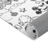 Shown in detail, the white stitched edge framing this black-and-white Mickey Mouse kids rug.