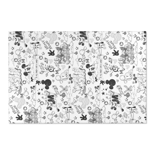 A personalized Mickey Mouse rug with a child's name in a kid's bedroom.