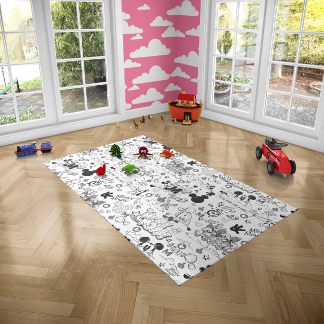 The durable, non-slip dotted rubber backing of the Mickey Mouse carpet.