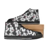 Front view of classic black Mickey Mouse sneakers for kids featuring durable canvas uppers and white laces.