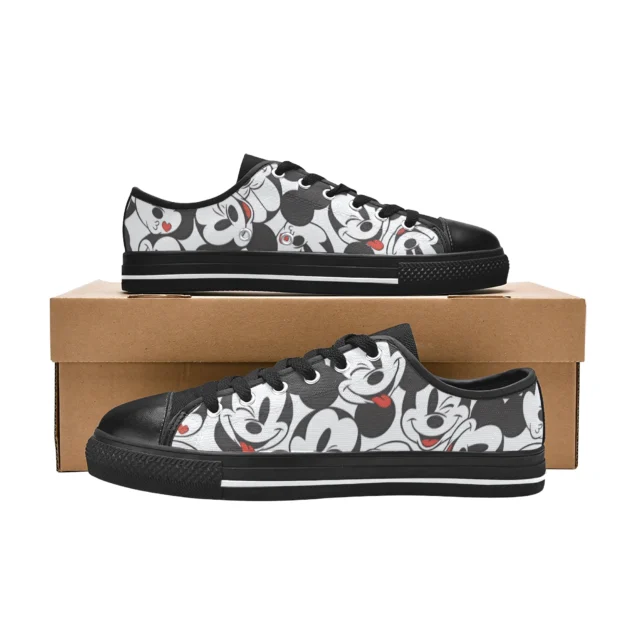 Side angle of comfortable black Mickey Mouse kids shoes displaying high-resolution cartoon graphics and non-slip rubber soles.