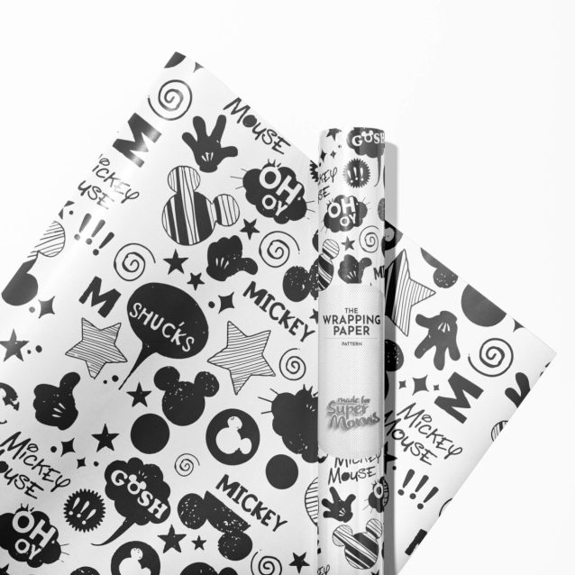 Gift wrapped in cheerful Mickey Mouse wrapping paper, tied with a bow.