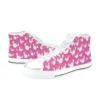 Side profile of custom pink Minnie Mouse canvas sneakers showcasing iconic cartoon mouse bows and breathable fabric.