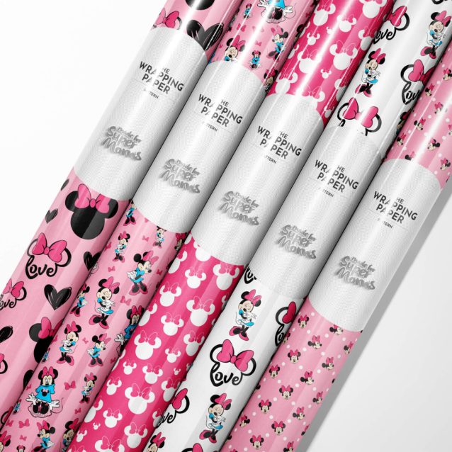 Roll of official Minnie Mouse wrapping paper featuring classic polka dot design.