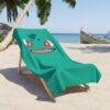 Folded Bulbasaur swim towel with a custom printed name, a soft terry summer essential.