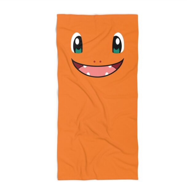 Laid flat, a Charmander beach towel with the printed name on soft quick-dry terry.